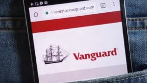 vanguard website displayed on a mobile phone screen representing vanguard etfs