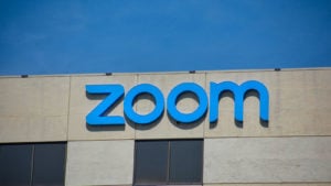 Zoom (ZM) logo on a building