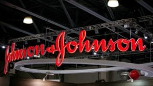 A red Johnson & Johnson (JNJ) sign hangs inside in Moscow, Russia.