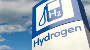 An image of a hydrogen fueling station against a blue sky.
