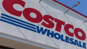 Costco (COST) logo on a sign on a Costco store.