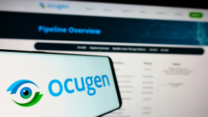Smartphone with logo of US biopharmaceutical company Ocugen Inc (OCGN) on screen in front of website Focus on left of phone display