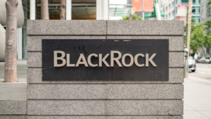 A BlackRock (BLK) sign out front of a BlackRock office in San Francisco, California.