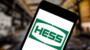 Hess (HES) logo on a phone screen