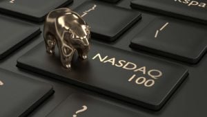 An image of a computer keyboard with the figure of a bear standing on top of a key that says Nasdaq 100