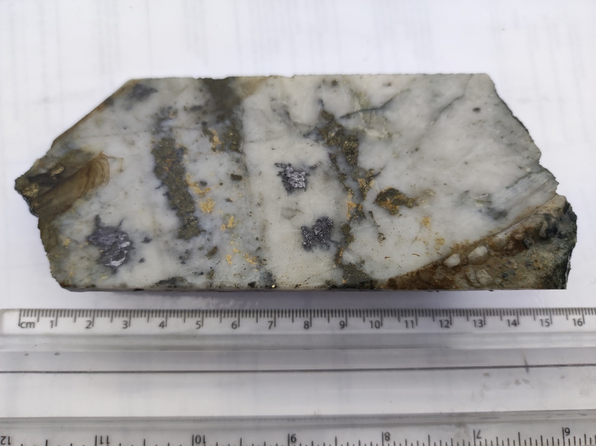 Part of a split section of drill core from a deeper intersection on hole FR-DD-22-UG-192 grading 75.2 g/t Au and 72 g/t Ag over a core length of 0.21