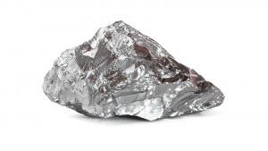 nickel stocks: a piece of nickel ore in front of a white background